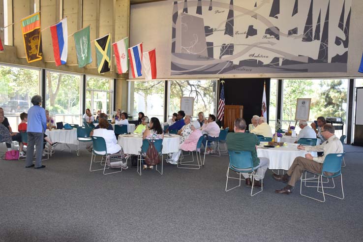 People enjoying the retiree brunch and campus tour