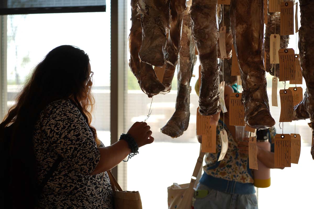 Students attend Art by US Exhibit in the Art Gallery on August 28, 2024.