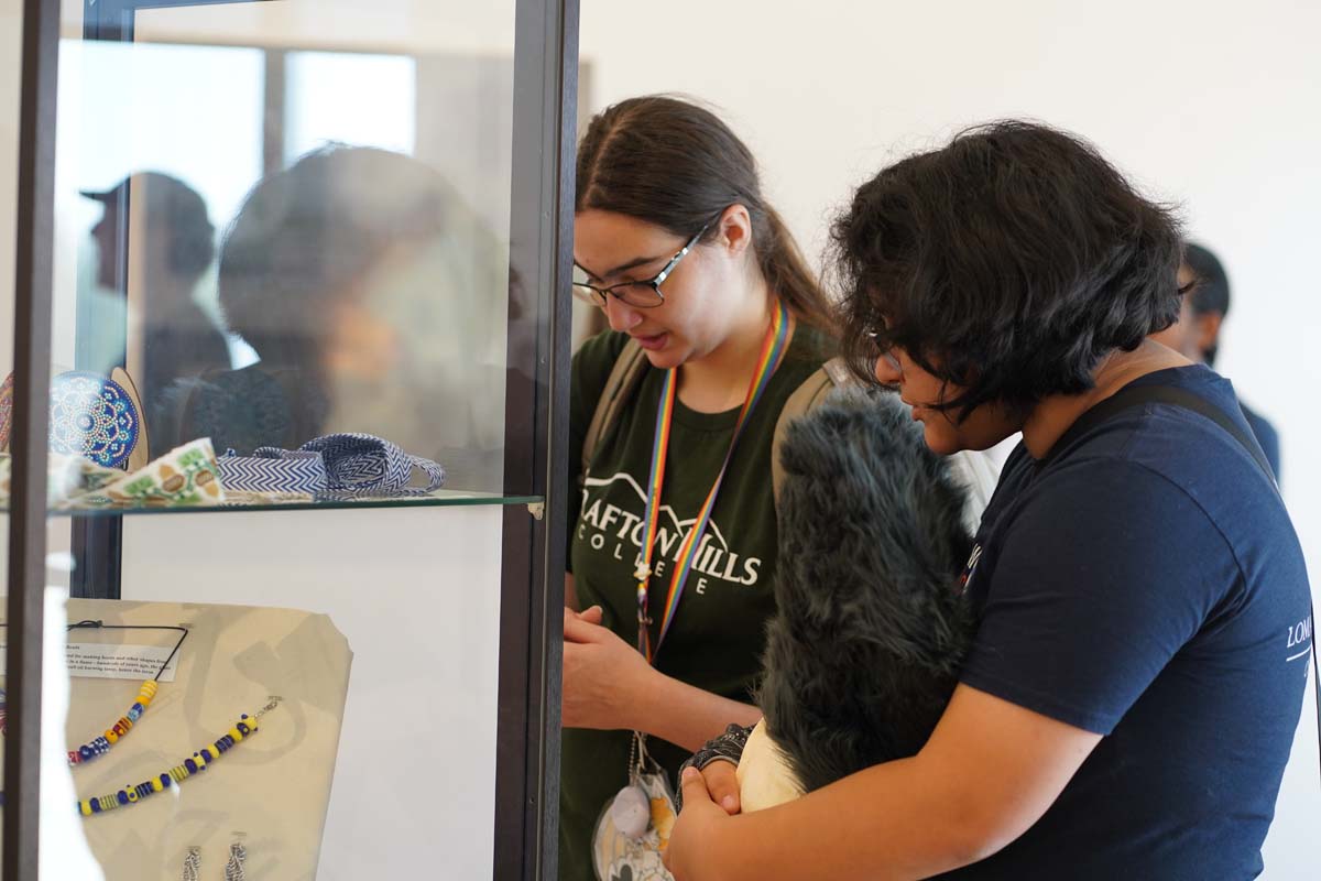 Students attend Art by US Exhibit in the Art Gallery on August 28, 2024.