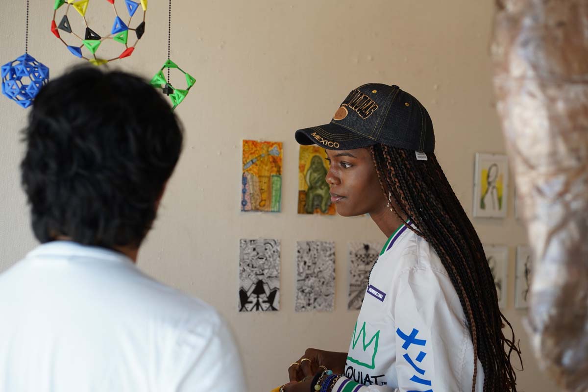 Students attend Art by US Exhibit in the Art Gallery on August 28, 2024.