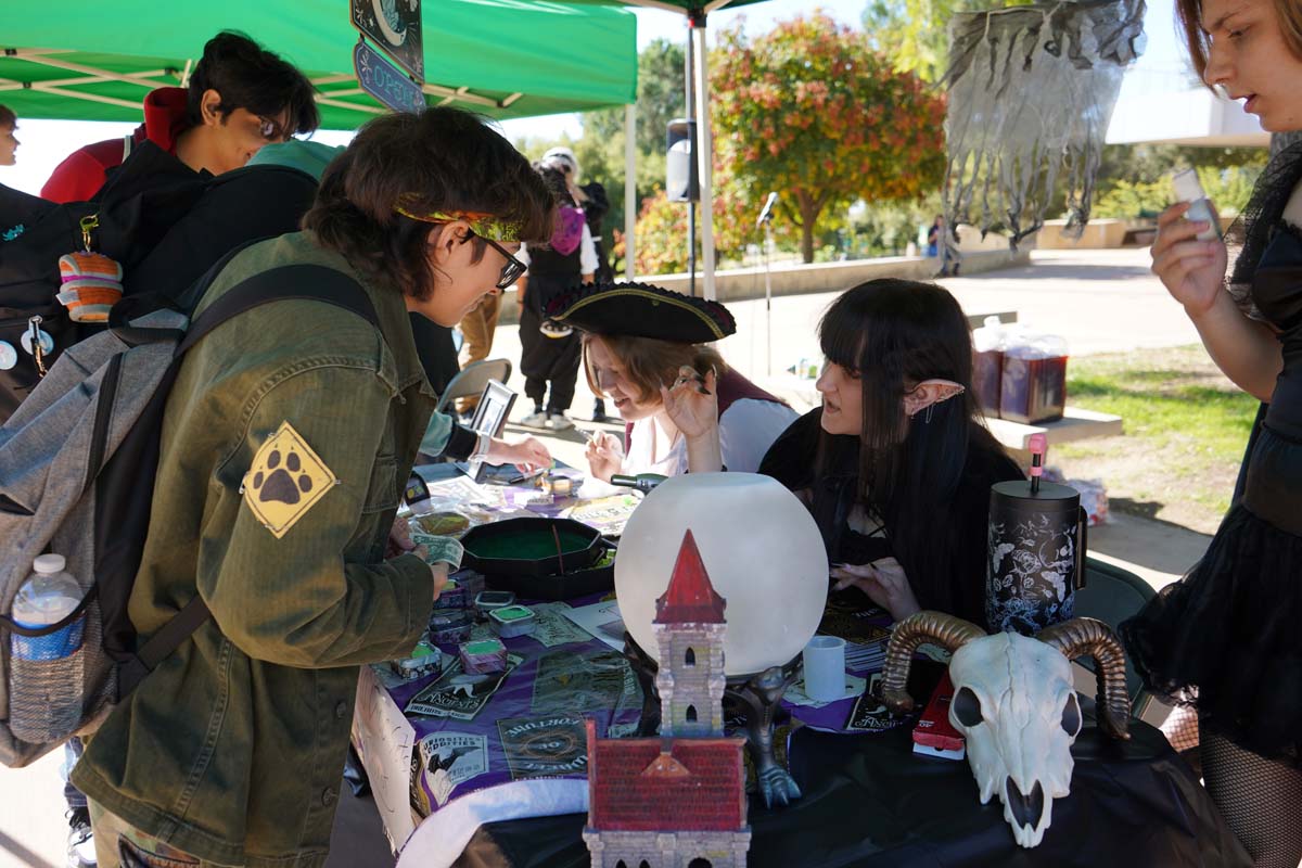 Students in costume at Halloween-themed Club Rush.